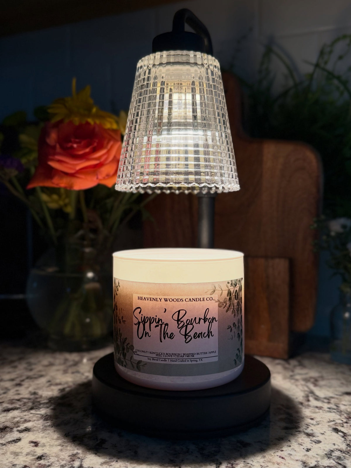 Heavenly Woods candle displayed in a cozy home setting